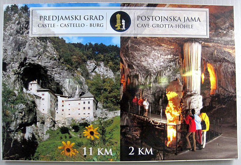 Werbeplakat am Bahnhof für die Höhle von Postojna