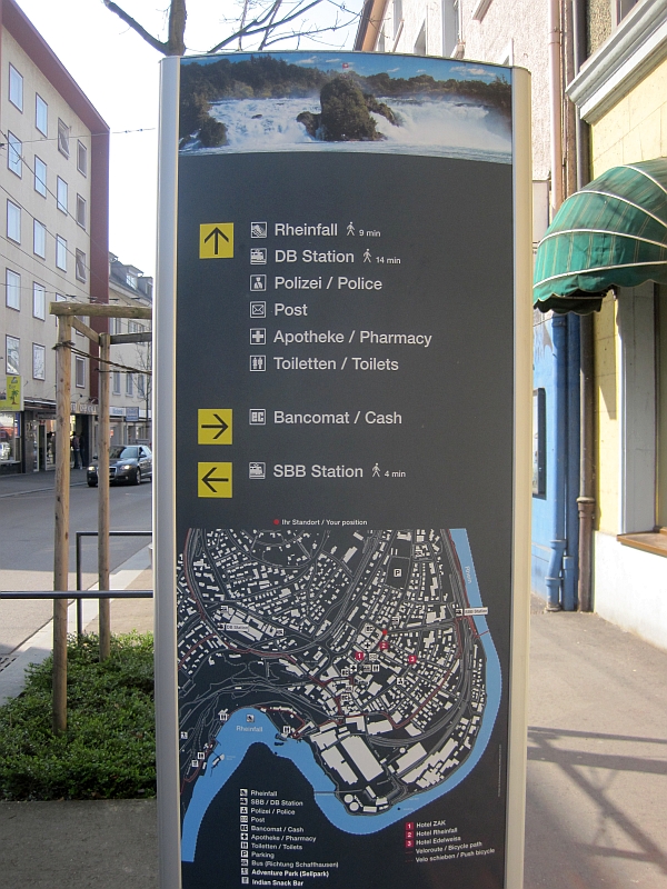 Wegweiser zu den Bahnhöfen in Neuhausen
